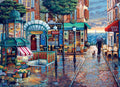 Cobble Hill 1000-piece jigsaw puzzle of a vibrant city street in Paris with cafes, shops, and a person walking with an umbrella.