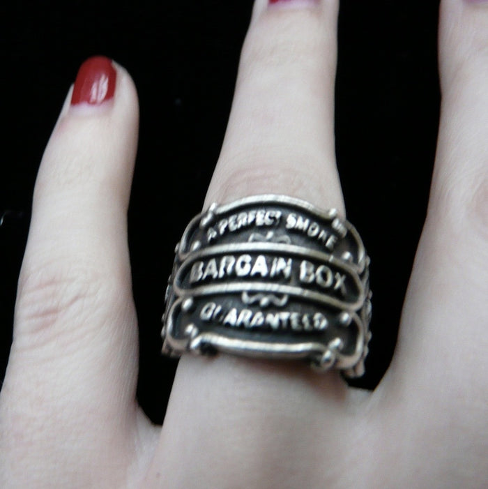 Vintage antique cuban cigar bands come to life as Sterling Silver Cigar Band Rings in 3D fashion statements. Shown here on talented musician/composer/recording artist, Paris Carney. O'Neill is her new musical project.And she just opened for Reeve Carney at his new "Truth" solo album record release.