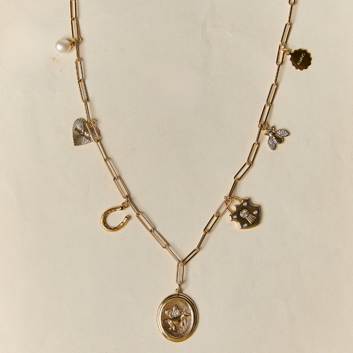 Pearl, Small Heart MAMA, Fortuna Horseshoe, Flying Piggy Coin, Shield Padlock, Bee with Pave Wings, Always Disc