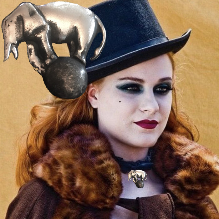 Evan Rachel Woods in Sterling Silver Big Top Elephant on Ball Charm. Approximately 1-1/2” by 1-1/2”. Vintage Oxidized Finish. Handmade in America with love and reverence. Hand signed. Comes with special ribbon or leather cord or you can easily slip any chain of your own through the generous back loop.    A portion of the profits from the sale of this piece will go to savetheelephants.org.