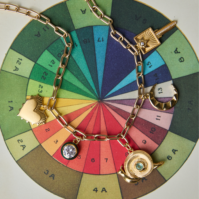 Green Enamel Bezel Charm on loaded charm necklace