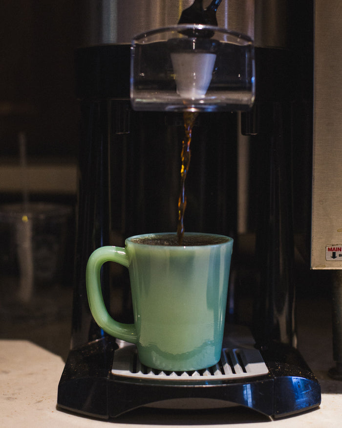 Hand-Eye Glass Mug