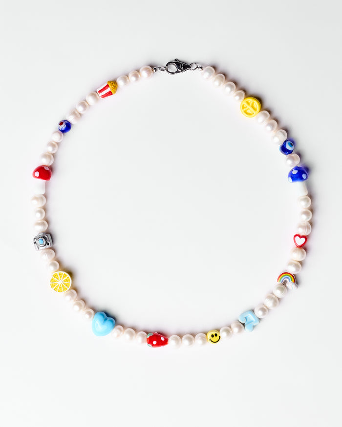 Pearl necklace with charms