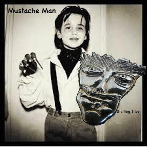 Picture of 8 year old Reeve Carney as an 8 year old Edward Scissorhands for Halloweeen. Another wonderful piece I  designed from a drawing one of my sons when he was only 8 years old. It has that little boy "feistiness" about it!  1--5/16" x 1-1/4" Hand Made in the USA. Hand signed.  Sterling Silver Mustache Man Face-in Pendant or Pin.