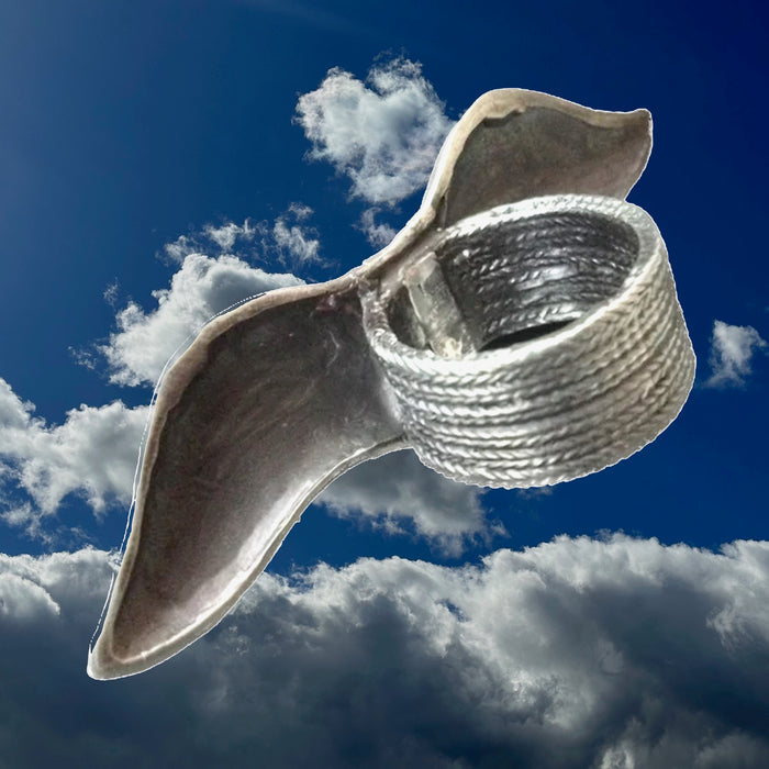 "Sterling silver Not Your Father's Mustache Ring floating against the sky — 3-inch wide handmade mustache ring by Fables in the Air"