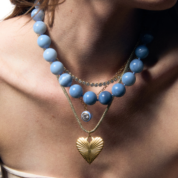 Blue Enamel Bezel Charm on chain, Bezel Tennis Necklace, Gumball Blue Gemstone Necklace, and Ribbed Heart of Gold Charm on Gold Lurex Cord