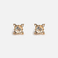 A pair of Solid Gold Moonstone Flat Back Studs featuring a central round moonstone, each accented by four smaller clear stones in a square pattern, displayed on a white background.