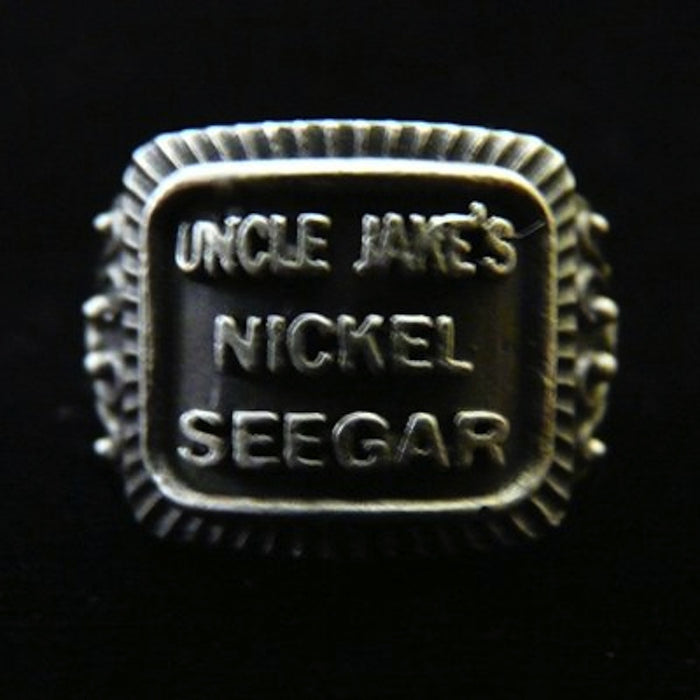 Even if you are not a cigar aficionado, this vintage cigar band ring is "smoking". The first in what will be an expansive and whimsical collection,  this 3D version of an actual antique "Seegar" band--the first of its kind. Sterling Silver in my antique satin oxidized finish to bring the old cigar band to life once again!  Top 1/2" wide approximately.  Made in the USA by hand. Hand signed.  Sterling Silver Uncle Jake's Nickel Seegar Cigar Band Ring.  Be sure to check out my other two cigar band rings--Mild