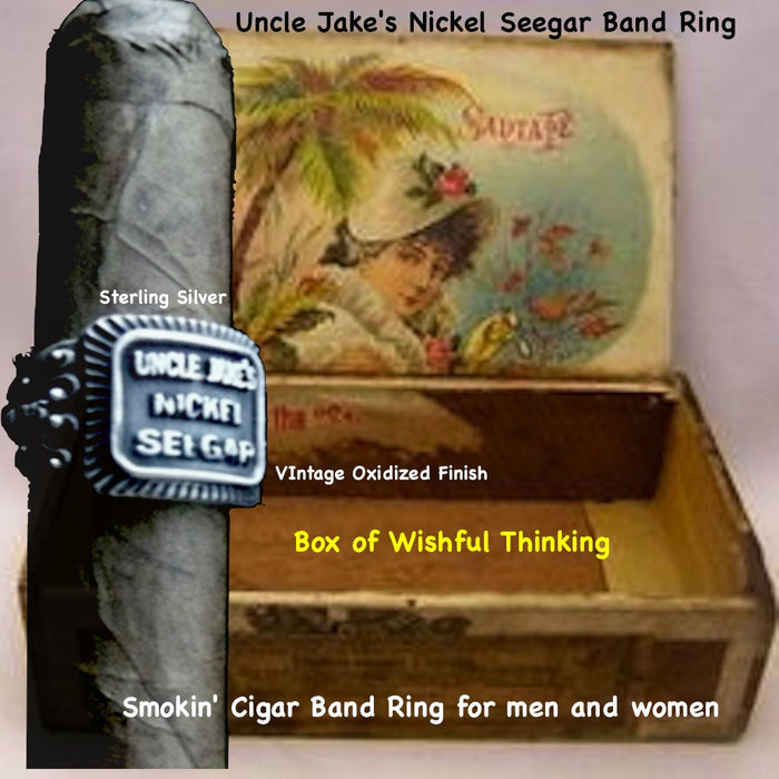 Even if you are not a cigar aficionado, this vintage cigar band ring is "smoking". The first in what will be an expansive and whimsical collection,  this 3D version of an actual antique "Seegar" band--the first of its kind. Sterling Silver in my antique satin oxidized finish to bring the old cigar band to life once again!  Top 1/2" wide approximately.  Made in the USA by hand. Hand signed.  Sterling Silver Uncle Jake's Nickel Seegar Cigar Band Ring.  Be sure to check out my other two cigar band rings--Mild