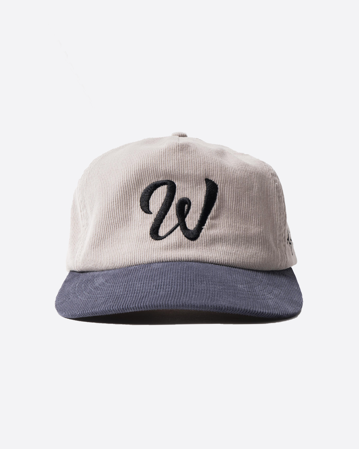 baseball cap with embroidered black W logo, adjustable strap, classic streetwear hat.
