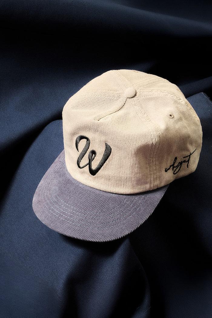 ap with embroidered white W logo