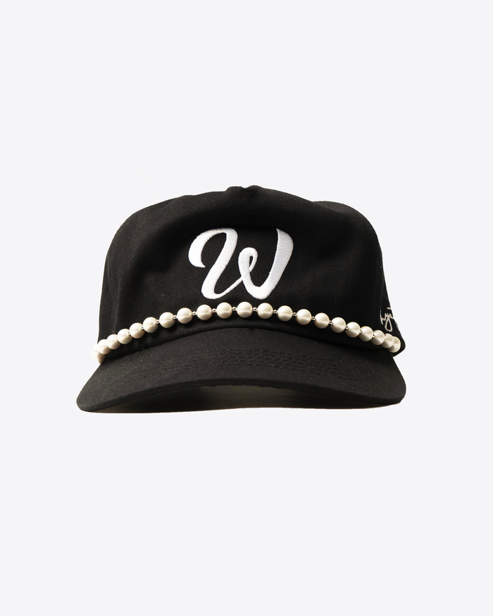 Black W cap with white embroidered ‘W’ logo and pearl details