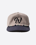 Cord baseball cap with black W logo and decorative pearl chain, adjustable fit, streetwear style.
